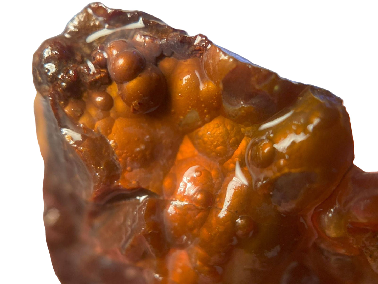 Close-up of a piece of Deer Creek Fire Agate Rough displaying orange fire