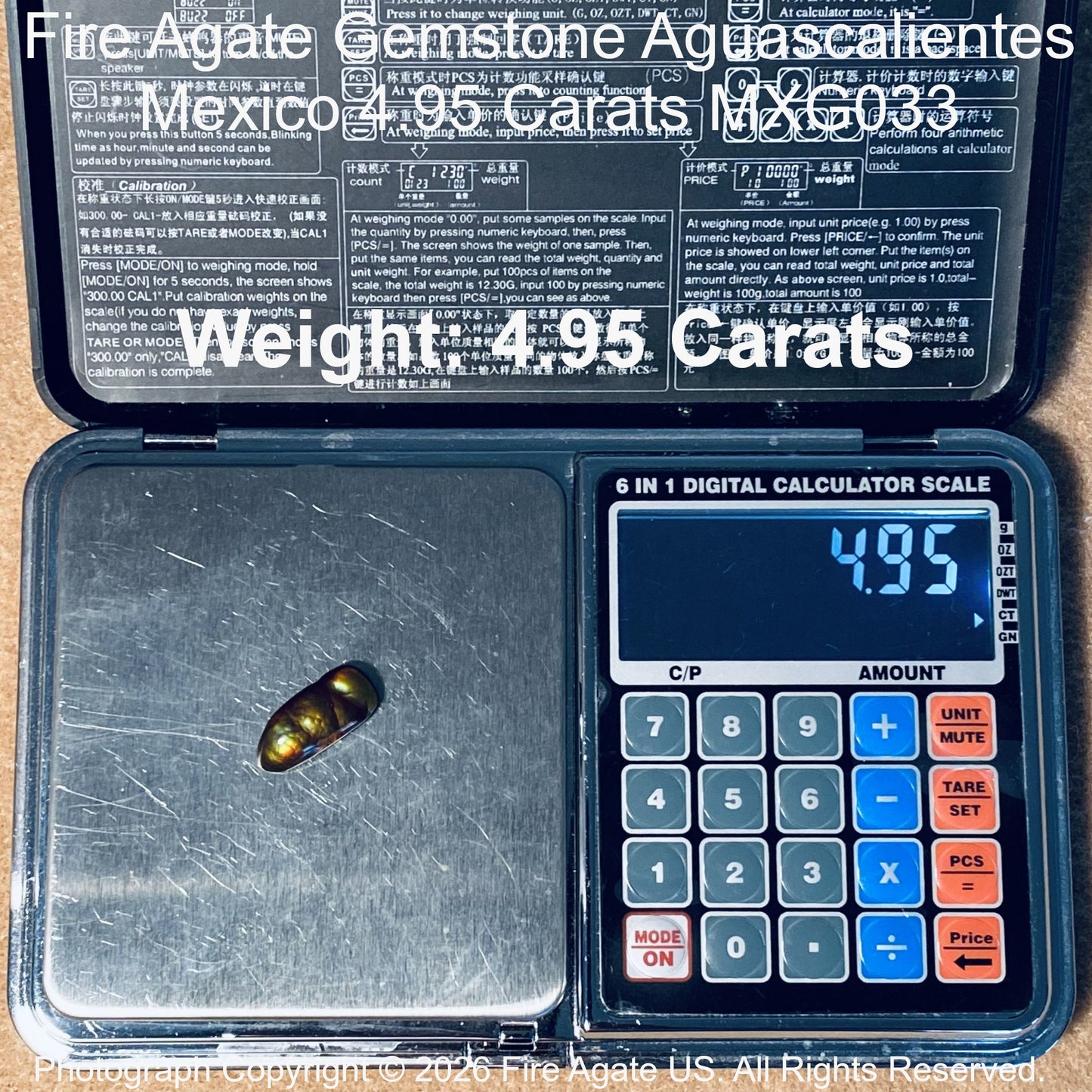 A 4.95 carat Fire Agate gemstone shown on a digital scale with its weight overlay displayed on the screen.