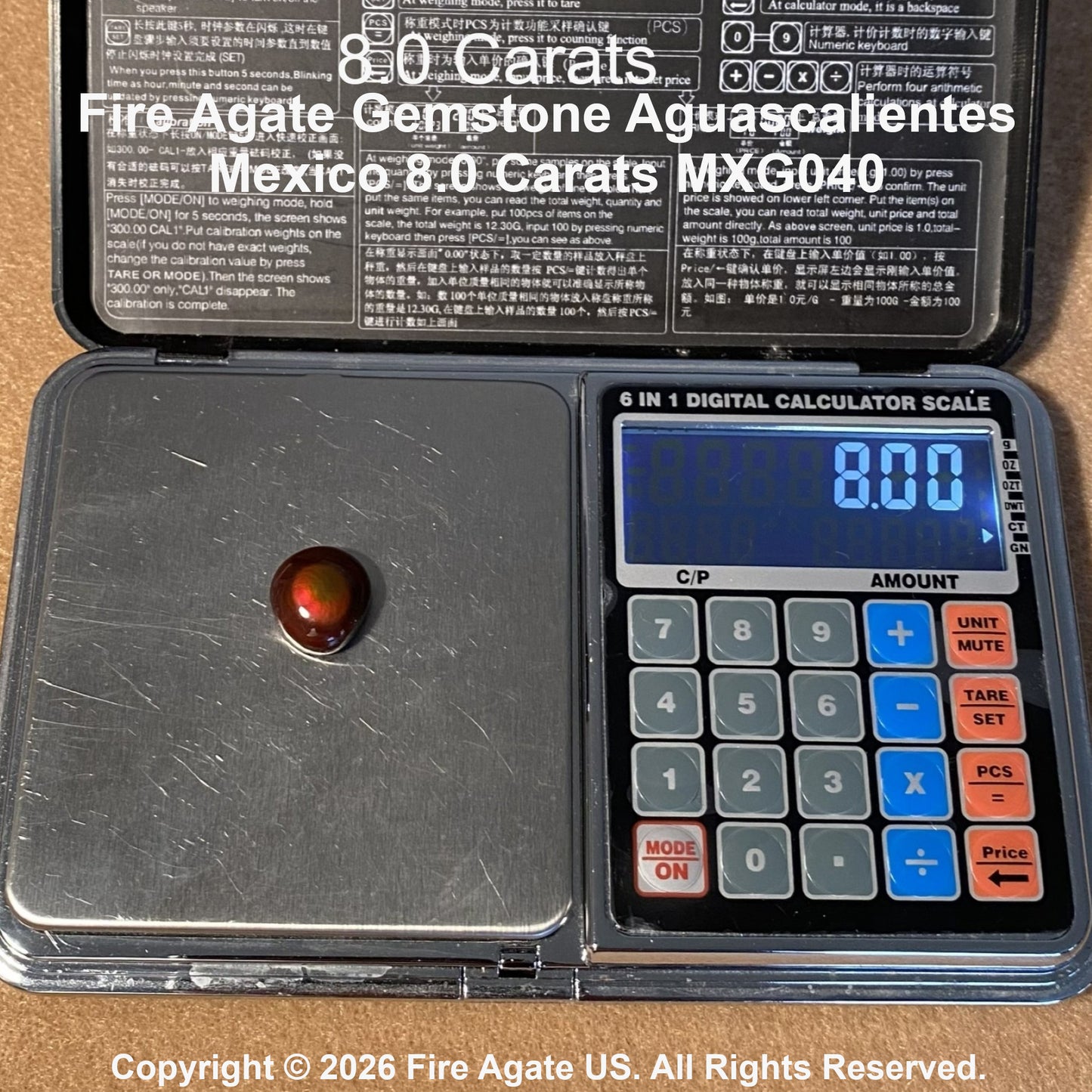 A 8.0 carat Fire Agate gemstone shown on a digital scale.