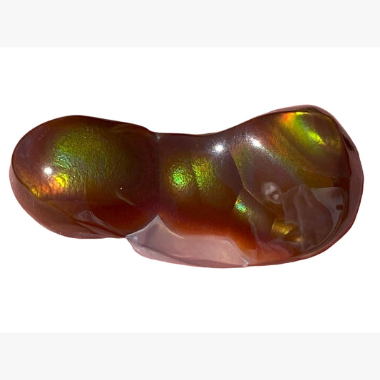 Multicolored Aguascalientes fire agate preform gemstone on a white background