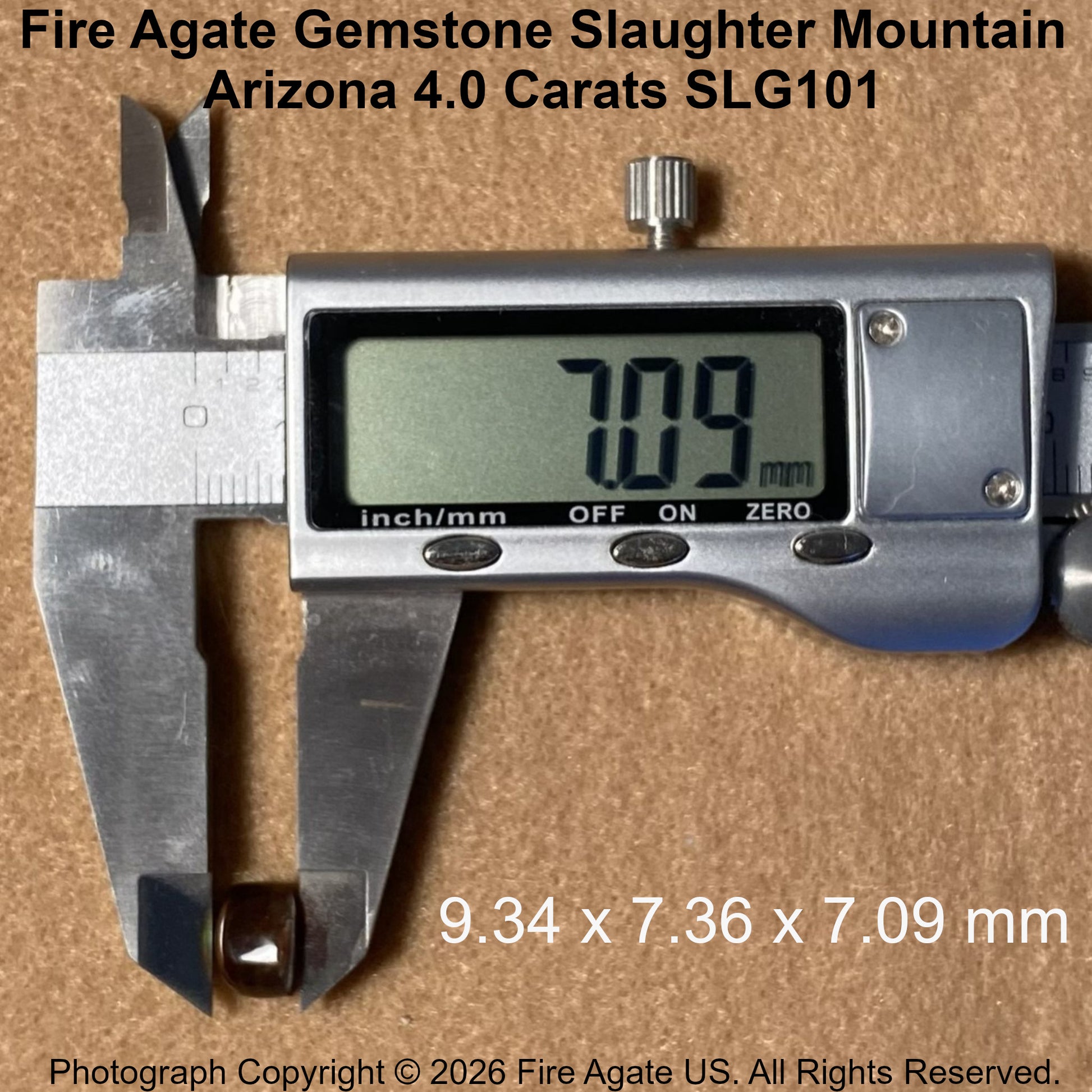 A silver digital caliper measuring a small fire agate gemstone, with text overlays showing the gemstone size 4.0 carats and dimensions 7.09 mm.