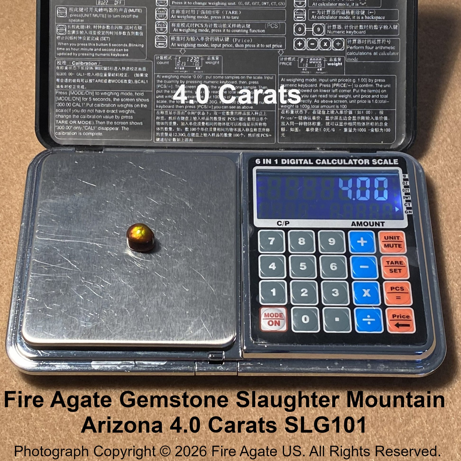 A digital scale with a small fire agate gemstone placed on its weighing platform, shown open with a printed instruction panel inside. Large text overlays reads 4.0 carats.