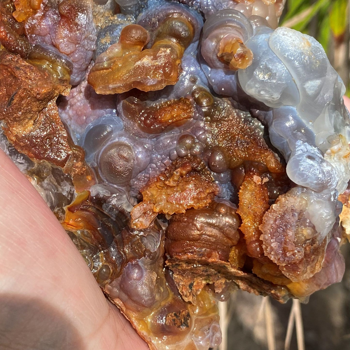 Close-up of a crystal with brown and clear formations