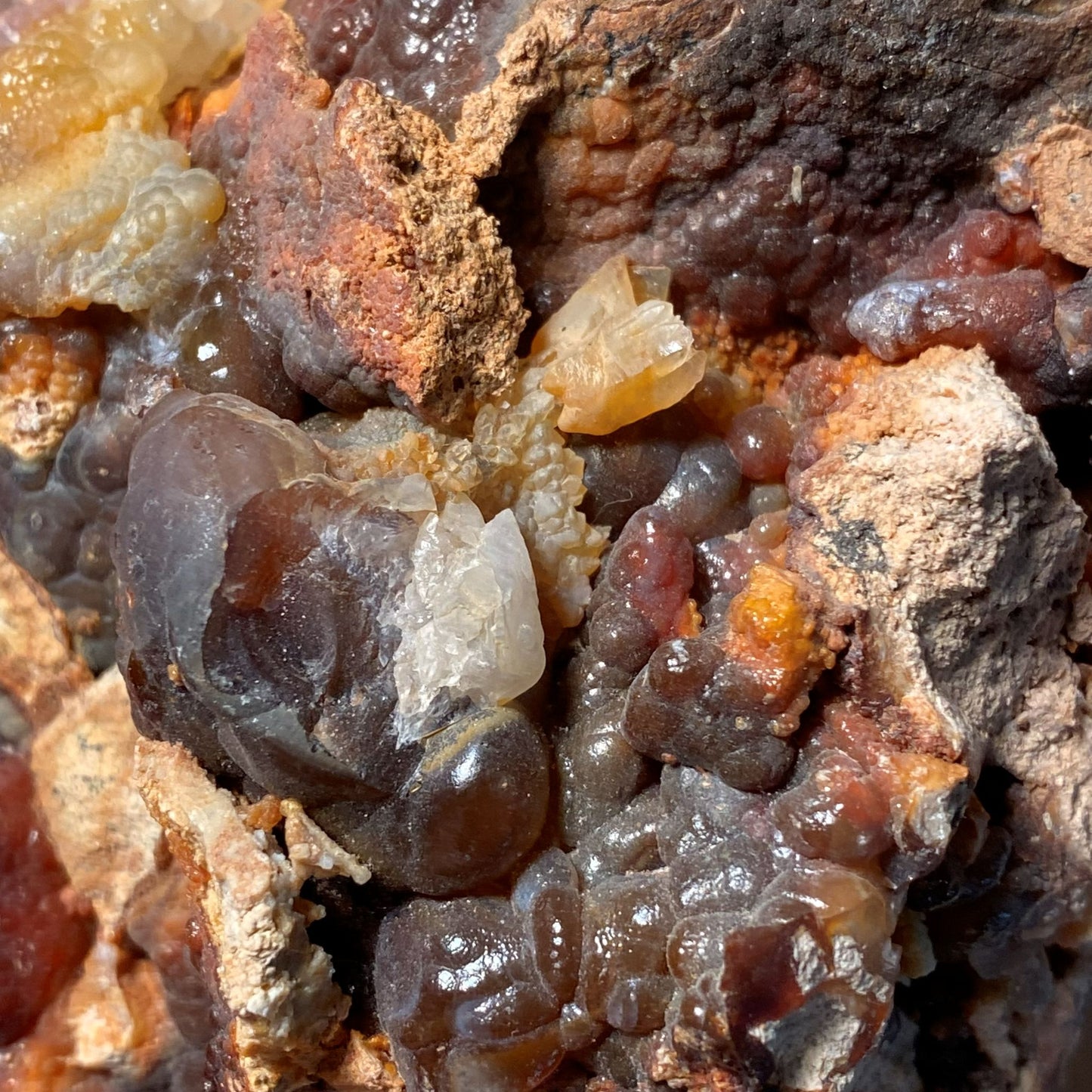 Close-up offire agate minerals on a rock surface