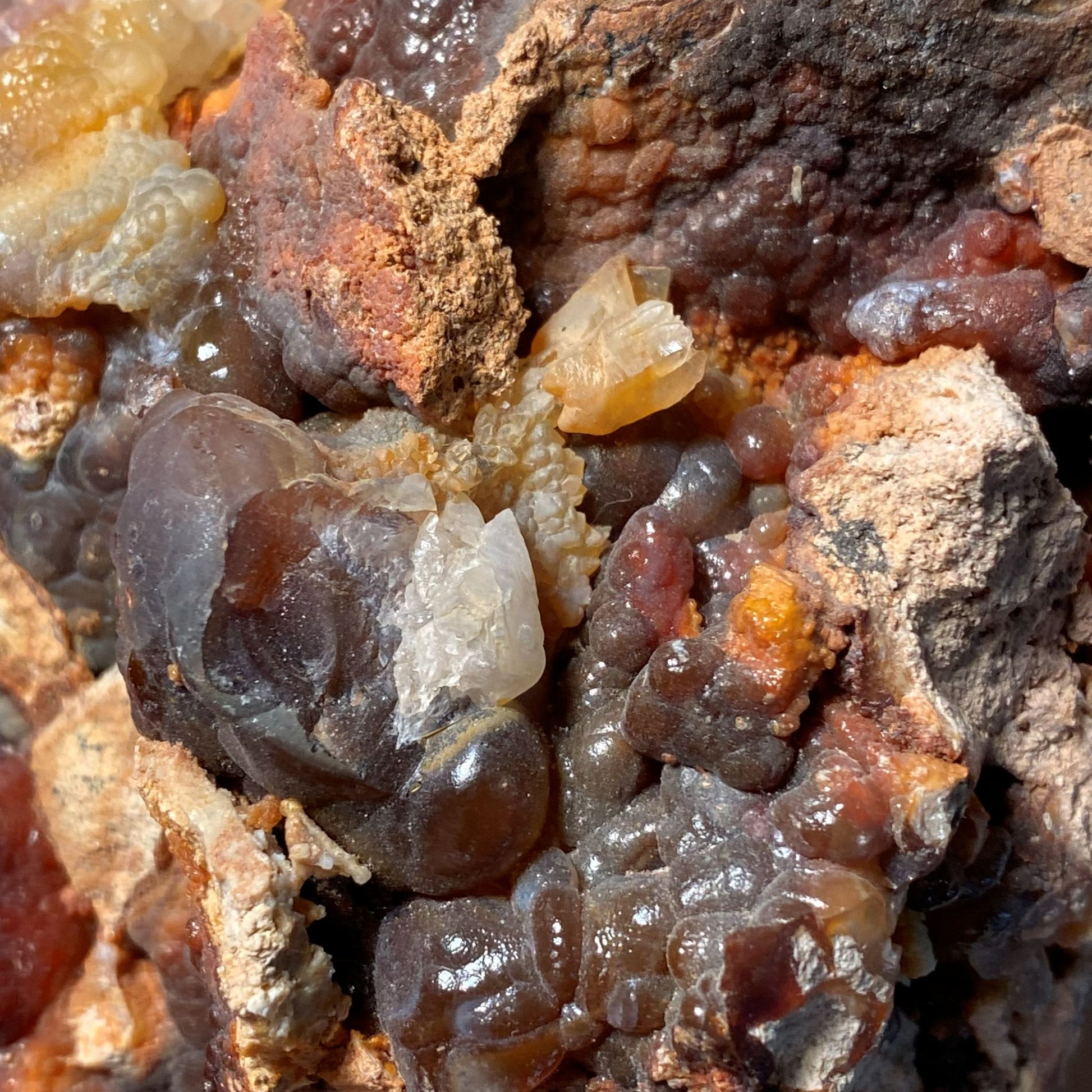 Close-up offire agate minerals on a rock surface